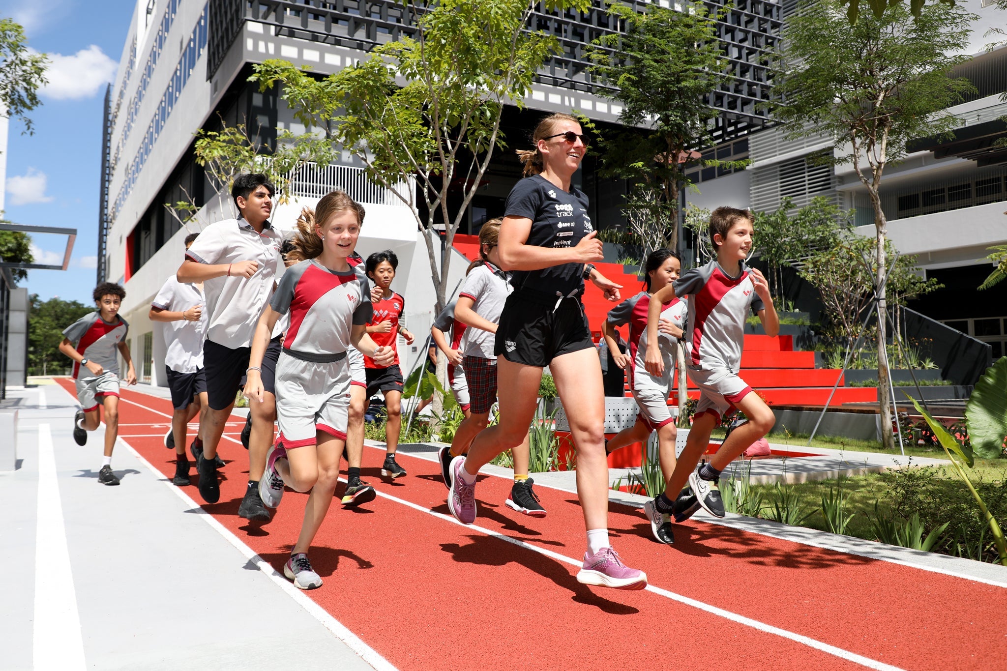 Singapore T100 Race Week: Pro Athletes Impart Experiences in School Visits